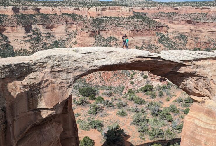 Wesley and Crosby stand atop an arch in Rattlesnake Canyon in Grand Junction, Colorado (Photo: Cynthia J. Drake)