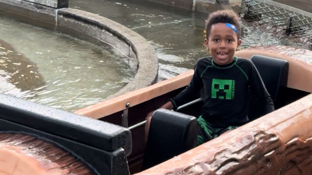 child on log ride at Rochester Seabreeze theme park