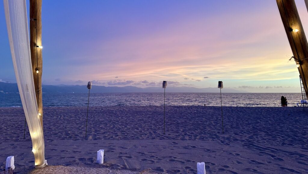 beach table in the evening at Velas Vallarta resort