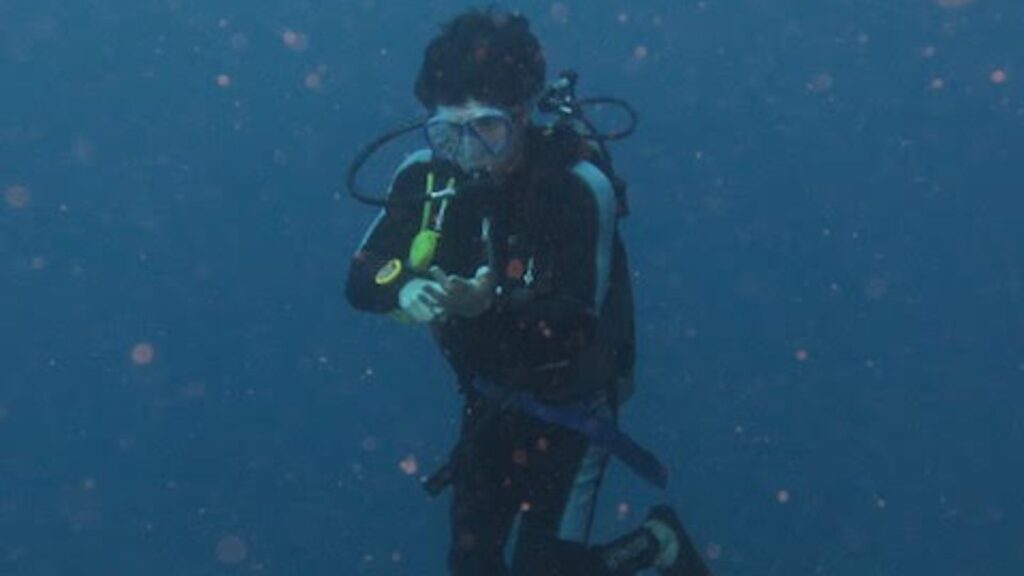 family of Judy Koutsky scuba diving