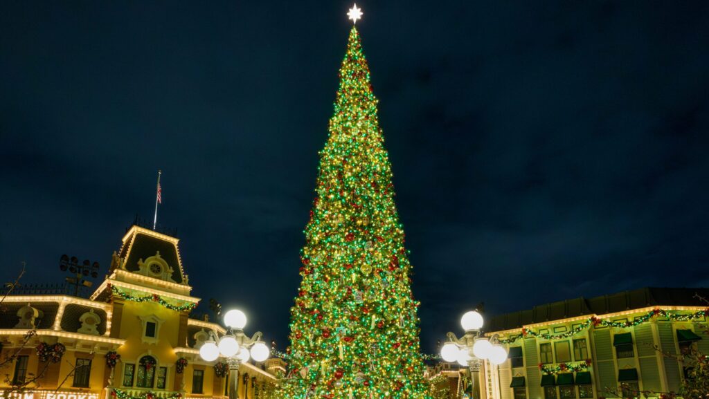 The Christmas tree lights up nightly during the holidays at Disneyland