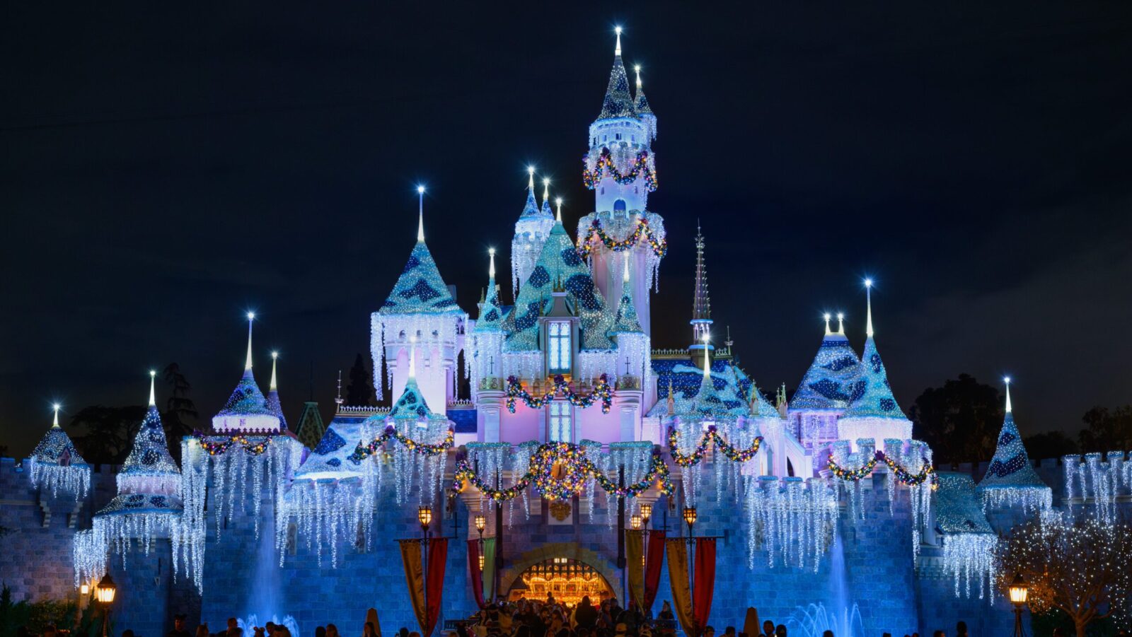 Sleeping Beauty Castle at night during the holidays at Disneyland