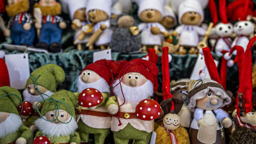 An assortment of holiday elves, trolls, and dolls