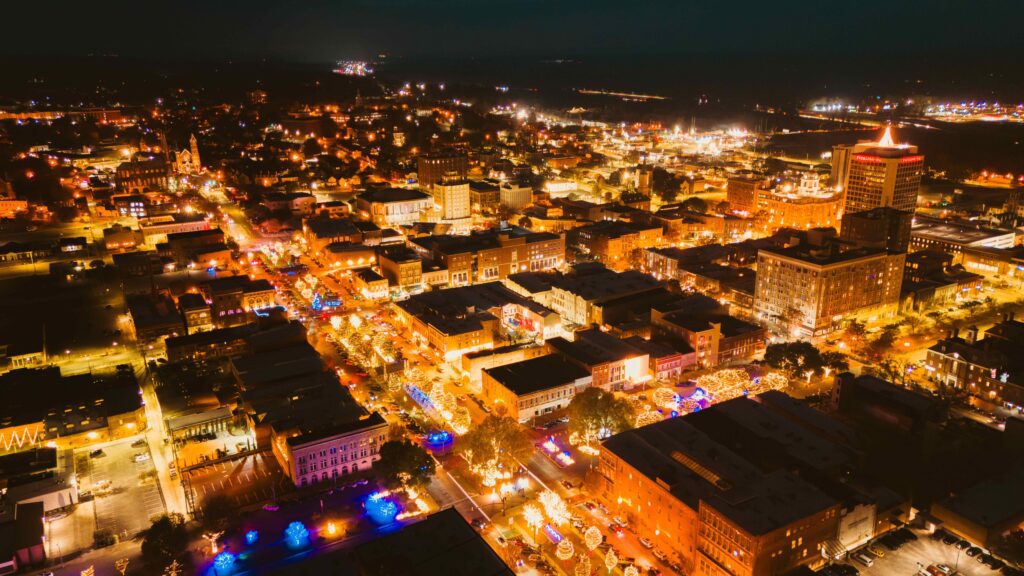 A nighttime view of downtown Macon, Georgia lit up for the holidays
