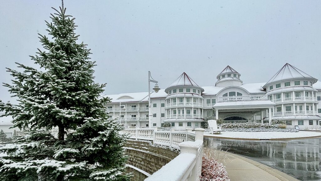 A snowy exterior view of Blue Harbor Resort