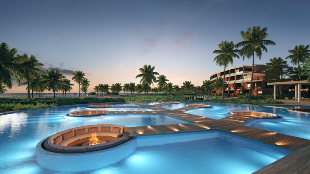 An evening view of a pool area at Zemi Miches All-Inclusive Resort