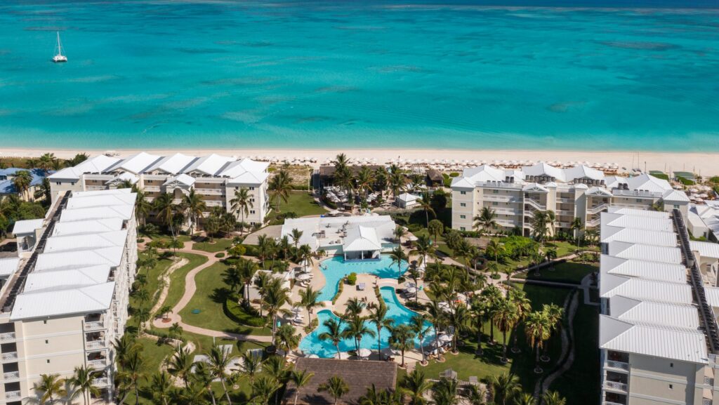 An aerial view of Alexandra Resort and its beach on Grace Bay