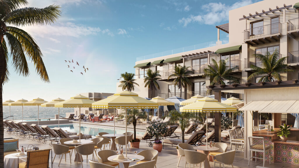 A rendering of the beachfront pool area with yellow umbrellas at La Bahia Hotel