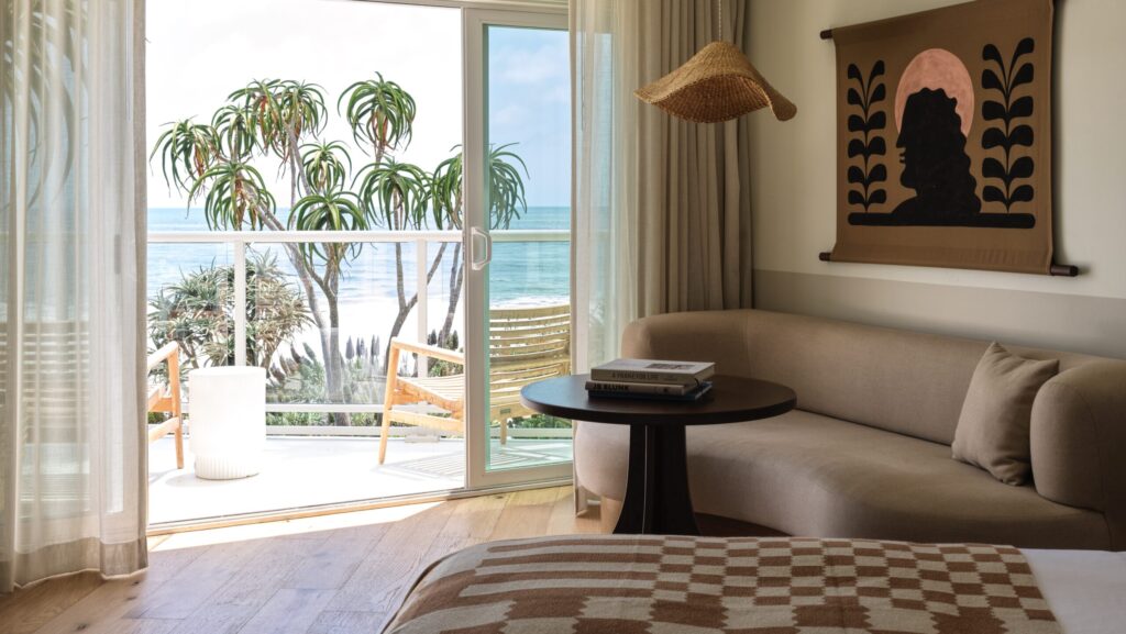 A guest room at Casa Loma Beach Hotel overlooking the beach in Santa Cruz