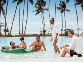 A multigenerational family hanging out in the pool at Club Med Miches Playa Esmeralda