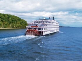 Riverboat going down a river