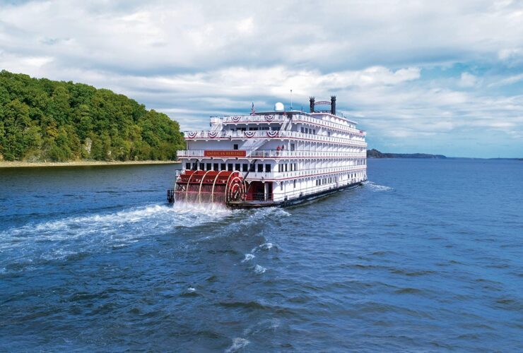 Riverboat going down a river