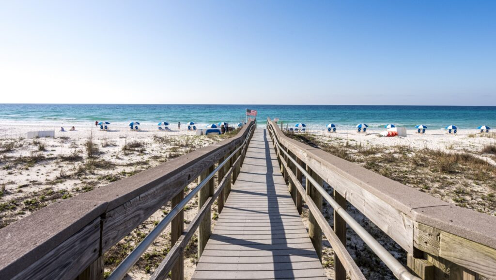 A boardwalk leading down to the white-sand beach at Pensacola Beach Resort
