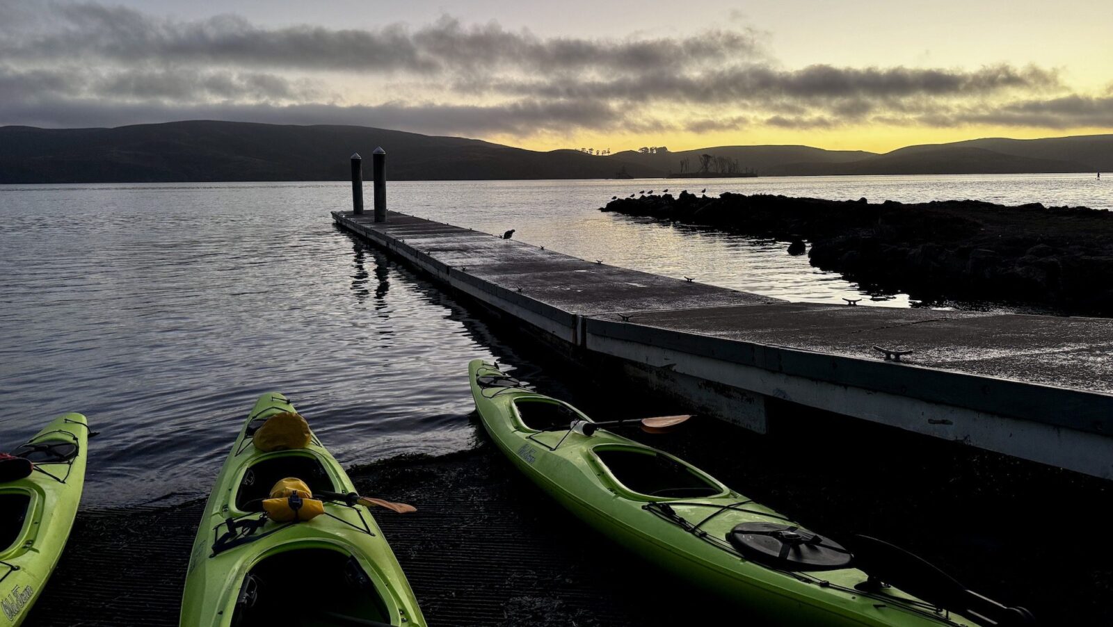 kayaks and Tomales Bay at dusk