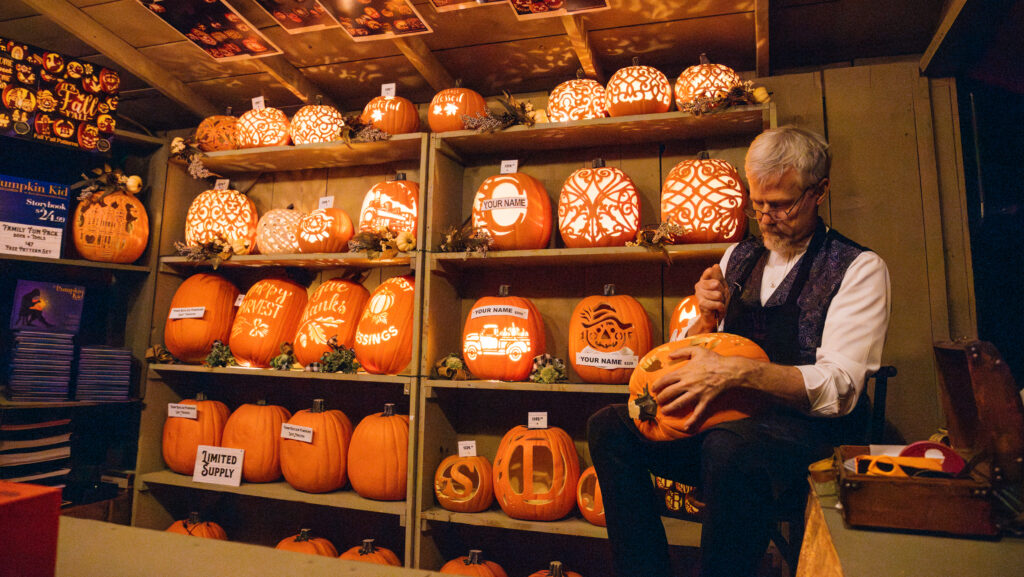 Man carving pumpkins at Silver Dollar City