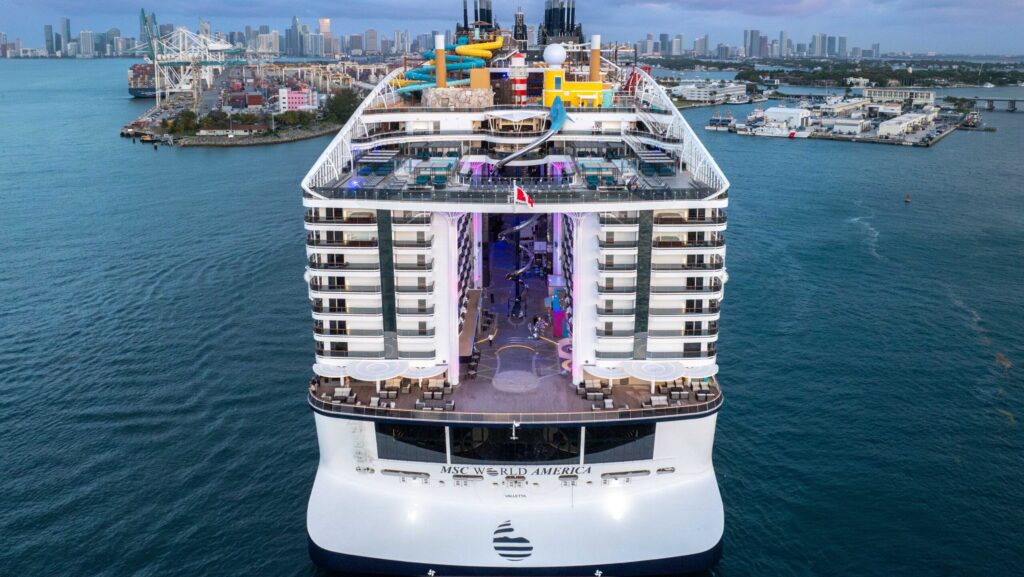 The back of MSC World America, which rises 22 decks and includes views of the World Promenade area and the waterslides in The Harbour district