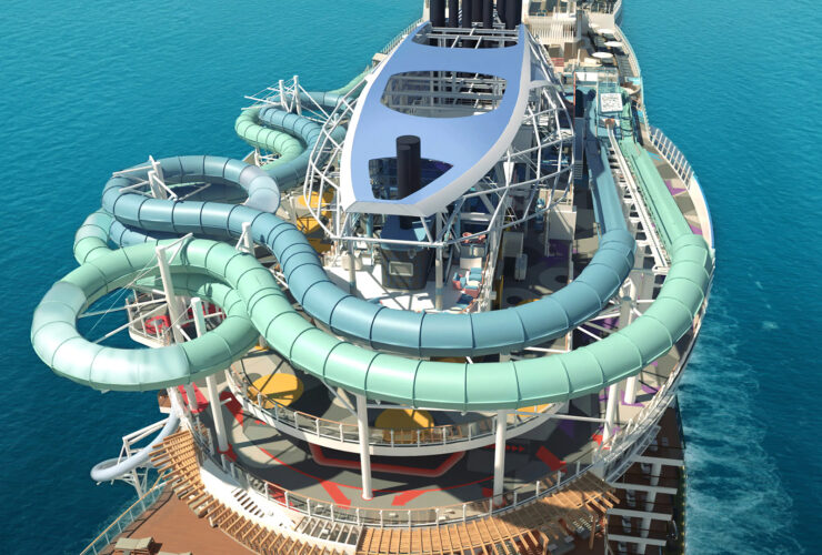 Top deck of cruise ship with two tube slides winding around