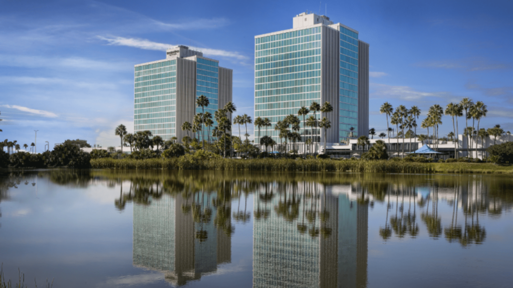 A view of the exterior of the two towers at DoubleTree by Hilton Hotel at the Entrance to Universal Orlando overlooking a lake