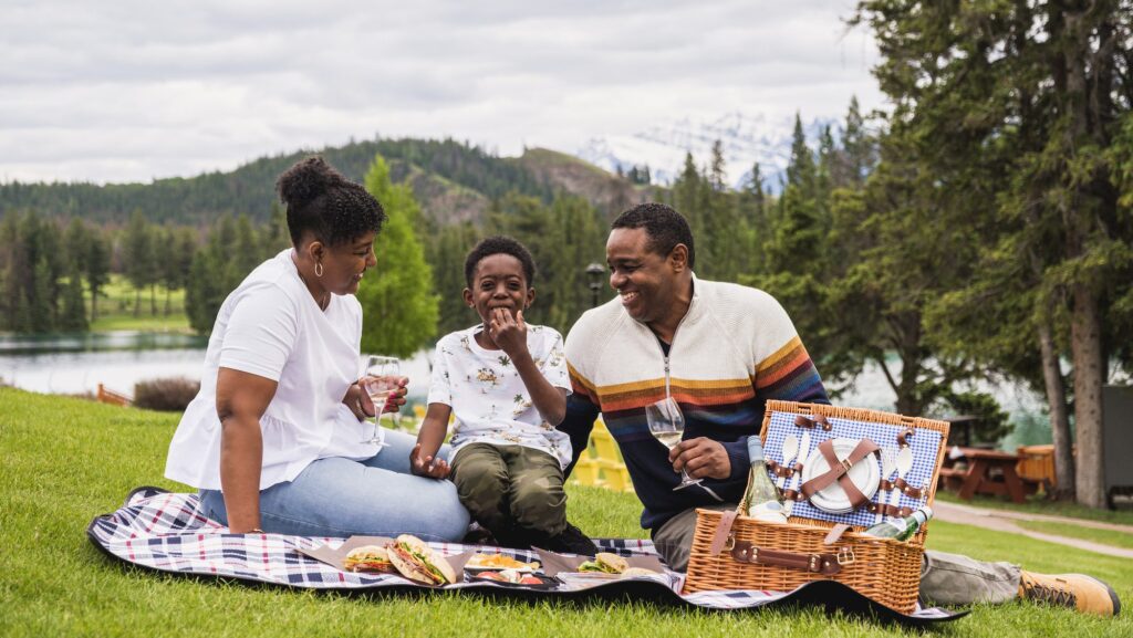 Family picnicking at the Fairmont Jasper Park Lodge