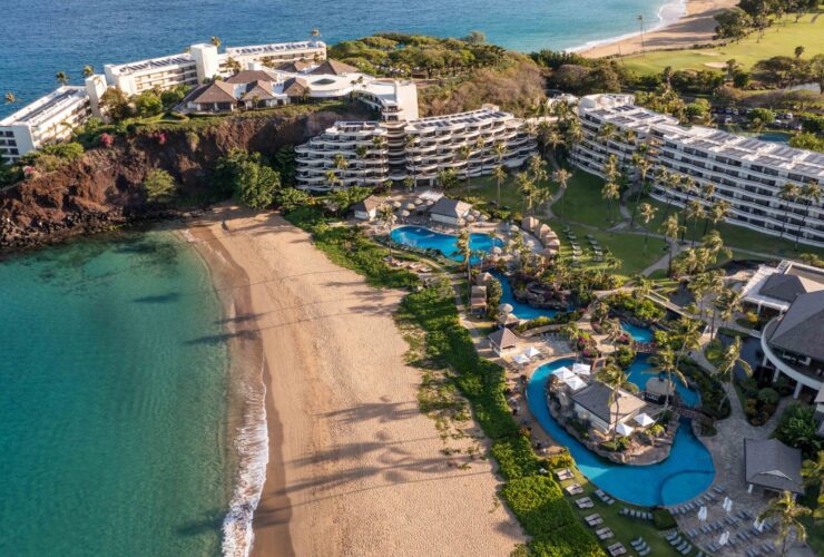 An aerial view of the buildings, pools, and beach at Sheraton Maui Resort & Spa