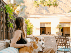 A woman and a dog outside at Royal Palms Resort and Spa, part of The Unbound Collection by Hyatt