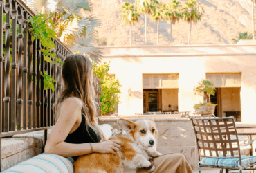 A woman and a dog outside at Royal Palms Resort and Spa, part of The Unbound Collection by Hyatt