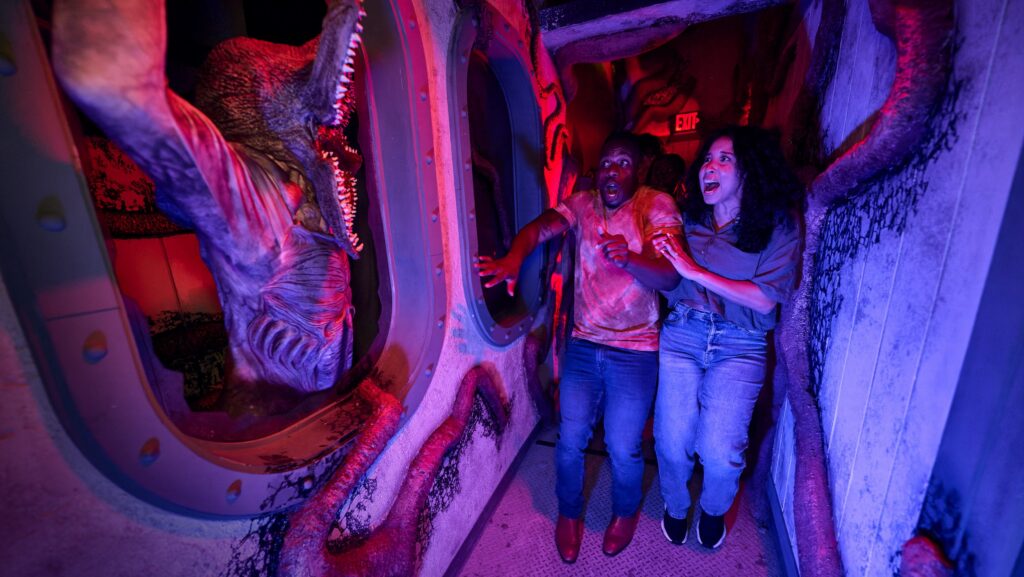 People being scared in a haunted house