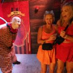 Two girls being scared at Halloween Horror Nights at Universal Orlando Resort