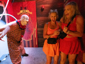 Two girls being scared at Halloween Horror Nights at Universal Orlando Resort