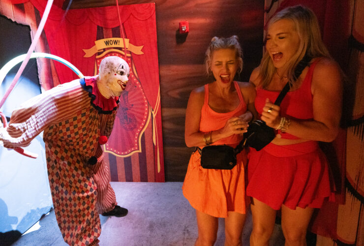 Two girls being scared at Halloween Horror Nights at Universal Orlando Resort