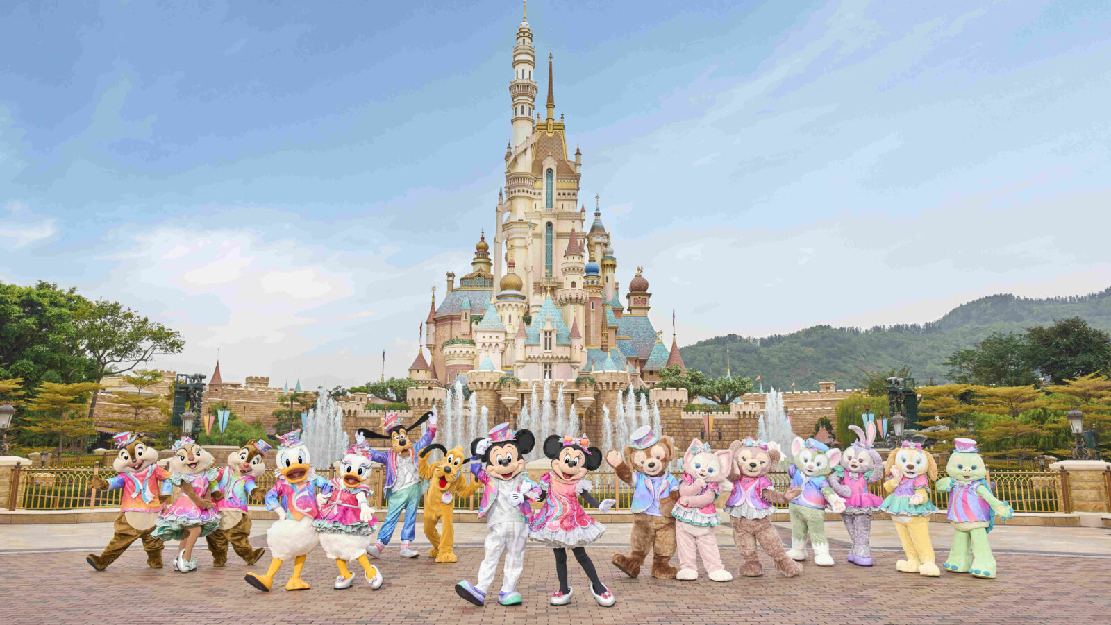 Hong Kong Disneyland's castle with characters in front of it.