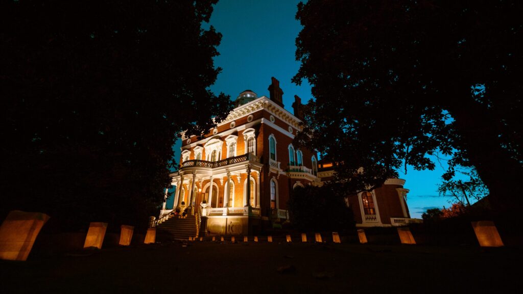 A nighttime view of Hay House in Macon, GA