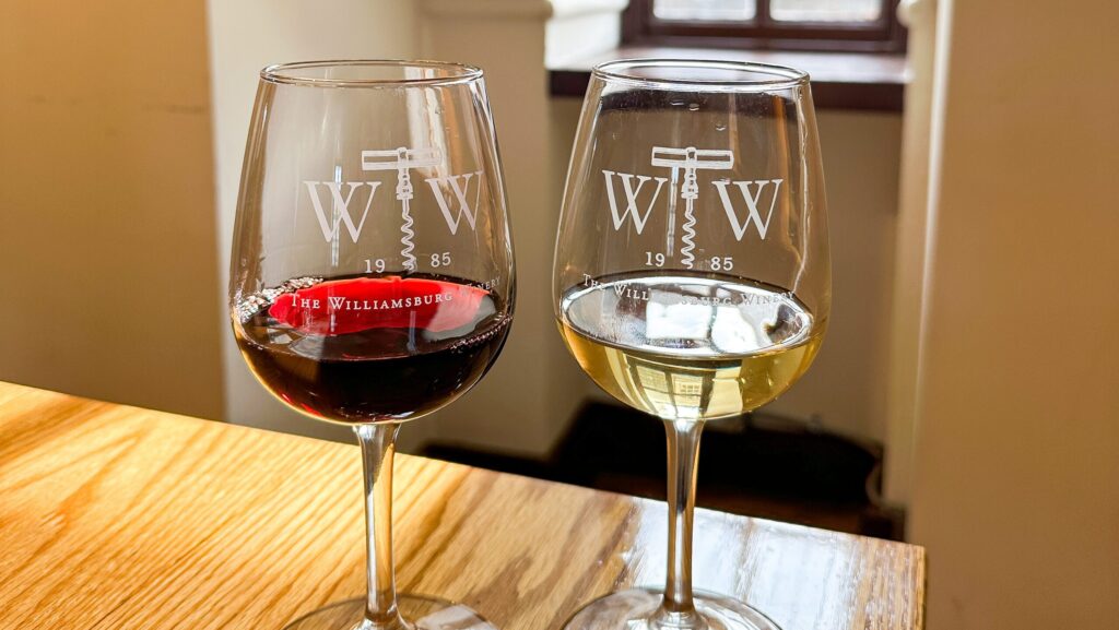 Glasses of red and white wine at the Williamsburg Winery tasting room