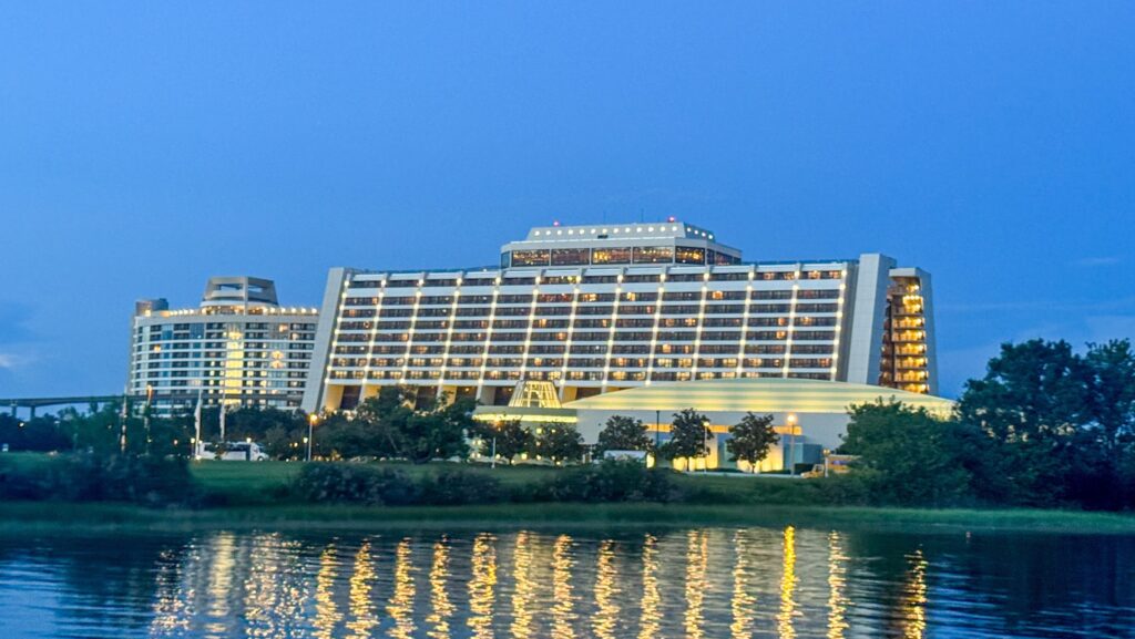 Disney's Contemporary Resort seen from Seven Seas Lagoon at twilight