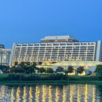 Disney's Contemporary Resort seen from Seven Seas Lagoon at twilight