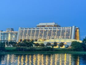 Disney's Contemporary Resort seen from Seven Seas Lagoon at twilight