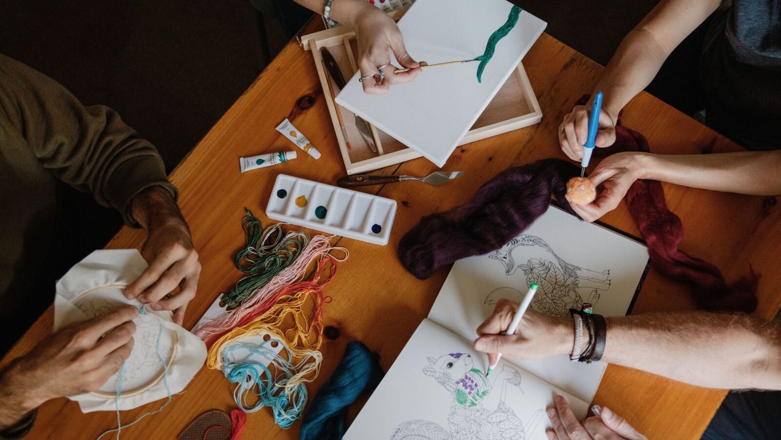 People doing relaxing crafts and art at Hemlock Neversink