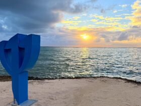 Club Med Punta Cana trident on the beach at sunrise