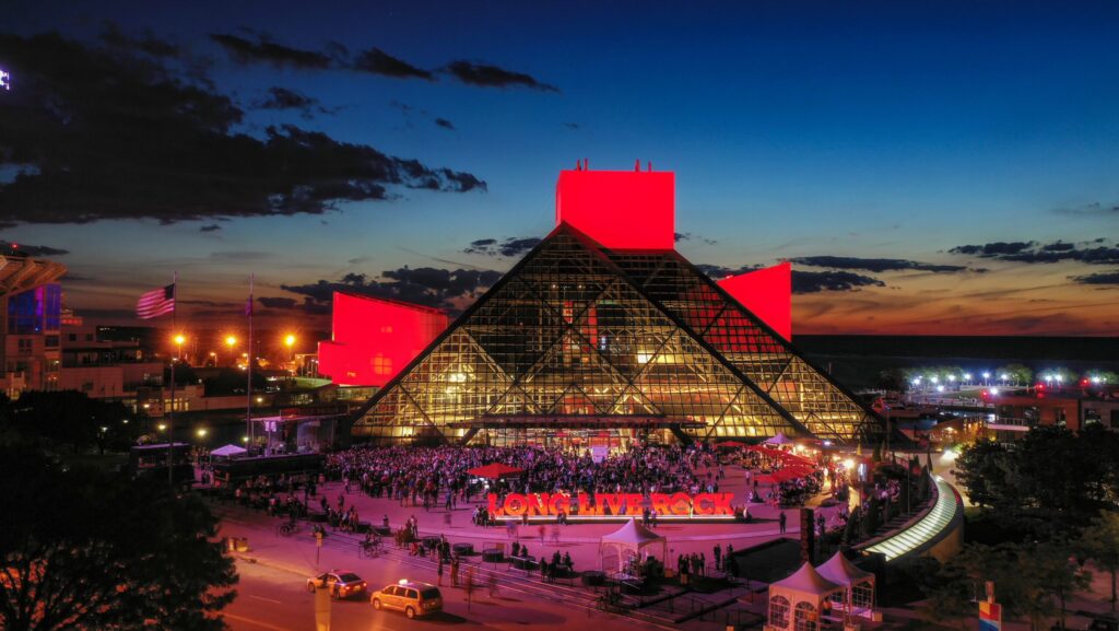 An aerial, nighttime view of the Rock and Roll Hall of Fame in Cleveland