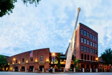 The exterior of the Louisville Slugger Museum & Factory with its giant bat