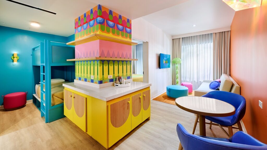 A rendering of a brightly colored family suite with bunkbeds at the upcoming Universal Kids Resort Hotel 