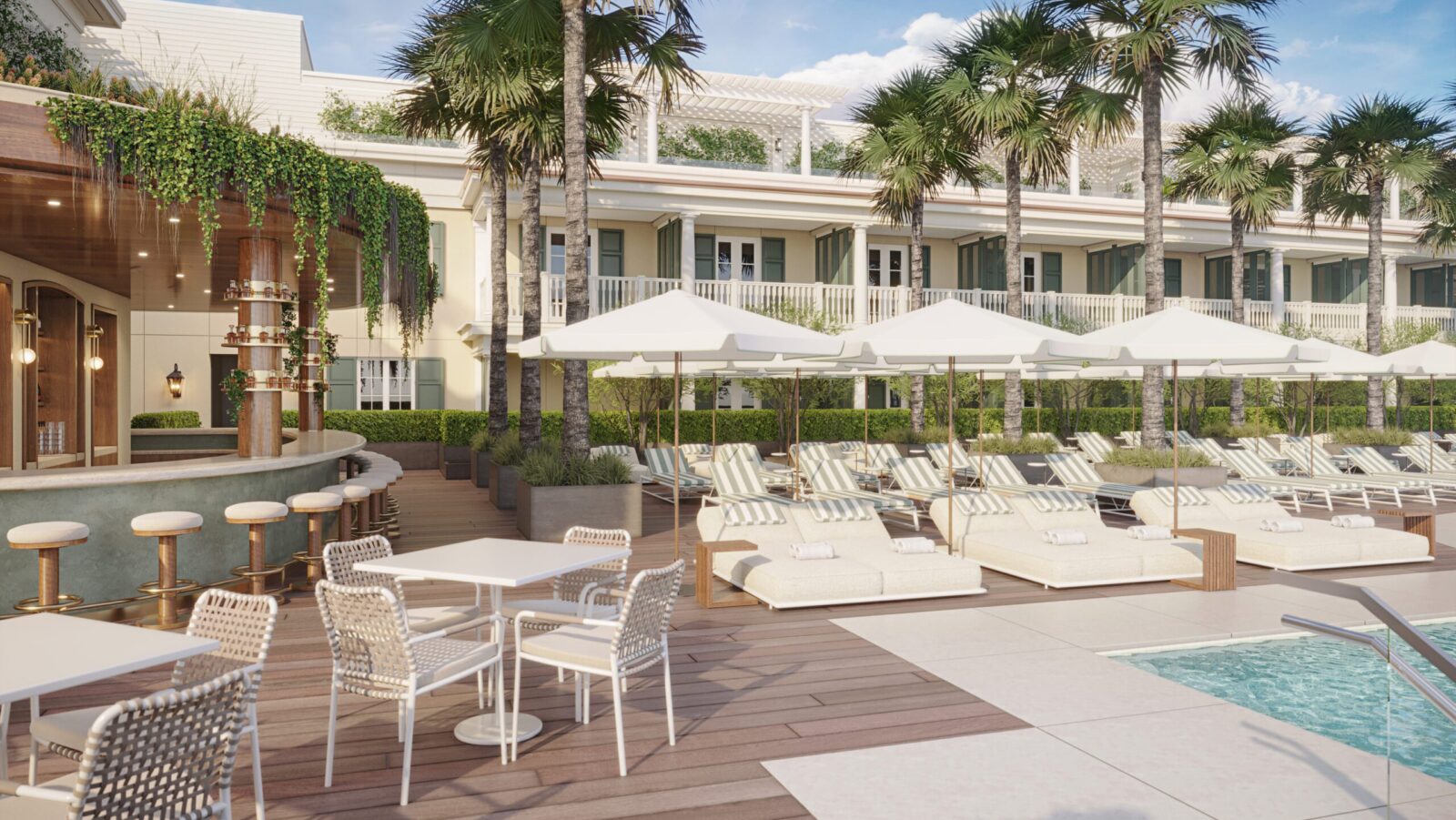 A rendering of the pool area with loungers and umbrellas and an outdoor bar at The Cooper