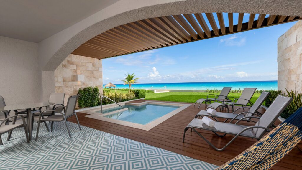 A view of the patio and plunge pool in a beachfront Enclave suite at Hilton Cancun Mar Caribe