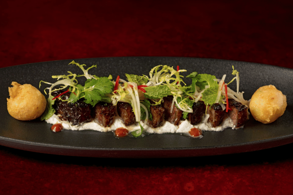 Laughing Tiger Salad is served at Napa Rose at Disneyland Resort