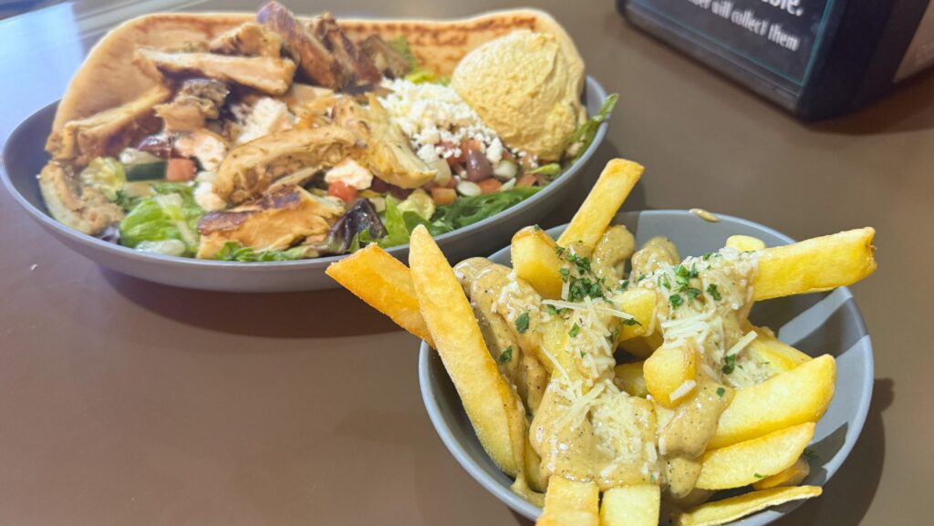 Mediterranean Salad and Black Garlic, Truffle, and Parmesan Fries from ABC Commissary at Hollywood Studios