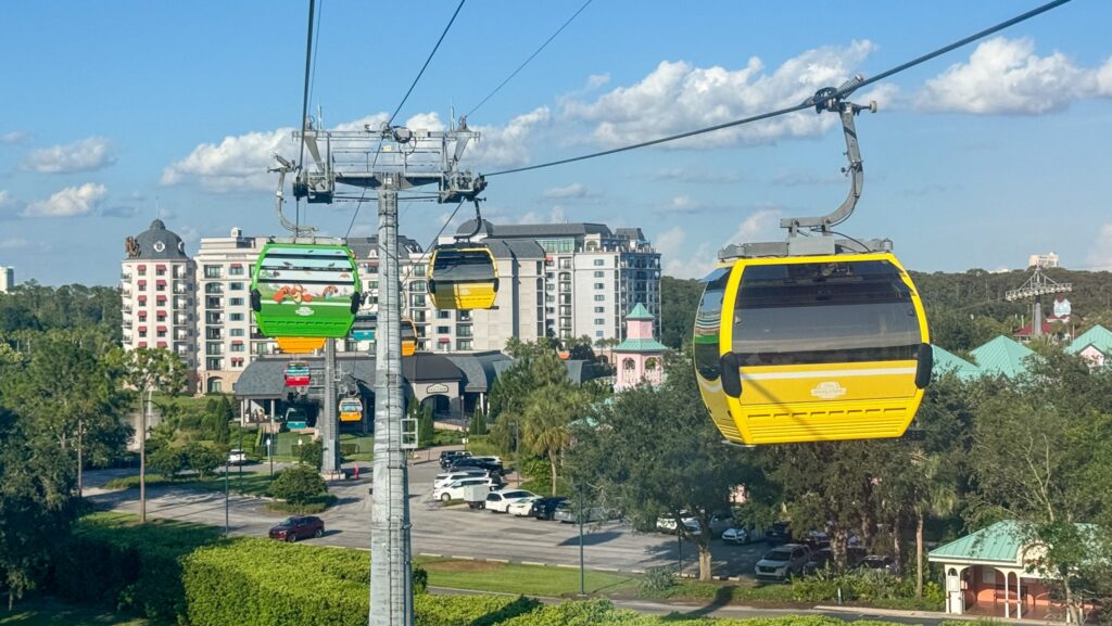 Disney Skyliner gondolas approaching Disney's Riviera Resort at Walt Disney World