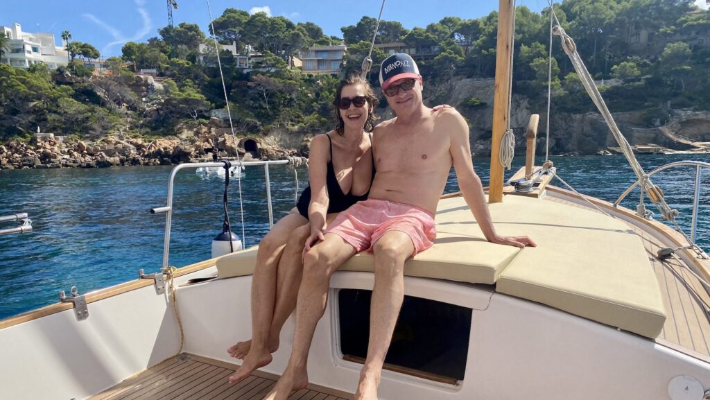 Allison TIbaldi and husband on a boat in Mallorca