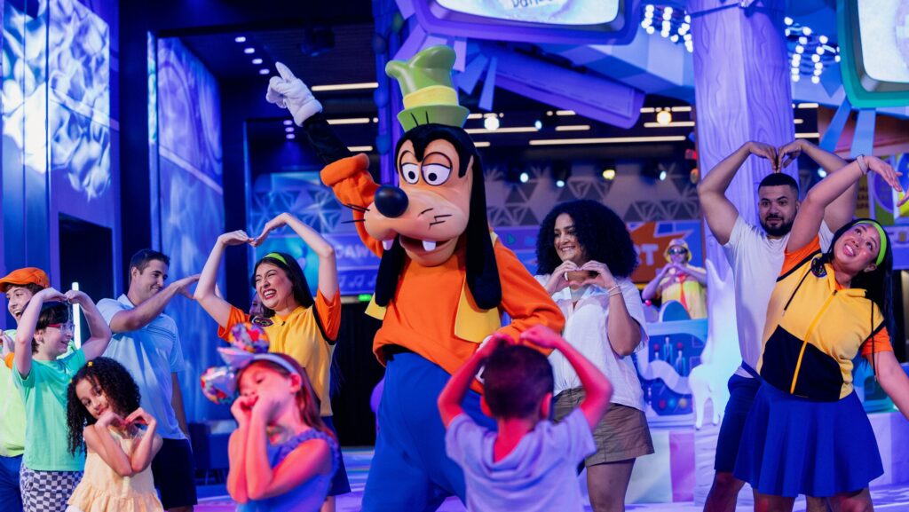 Goofy dancing with kids at EPCOT