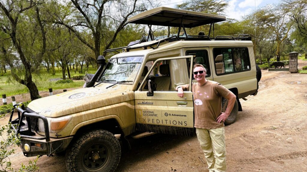 Author at the gates of Lake Nakuru National Park, Kenya (Photo: Dave Parfitt)