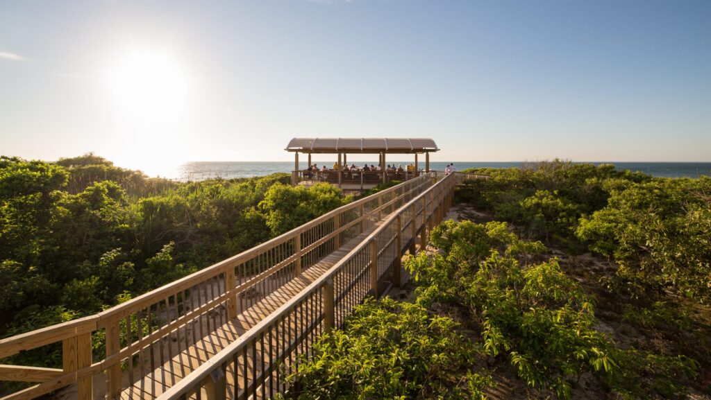 The boardwalk leading down to the beach and the Beach Bar at Ocean Edge Resort & Golf Club